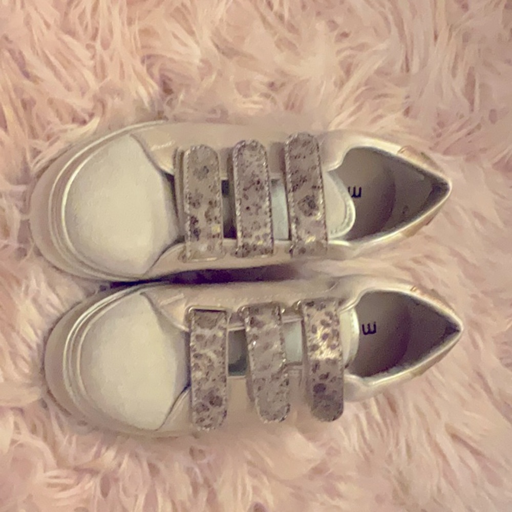 These moow sneakers are size six and include pink and sparkly designs